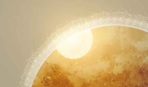 semi-circle of golden sun with patterned halo and circluar glow spot on edge